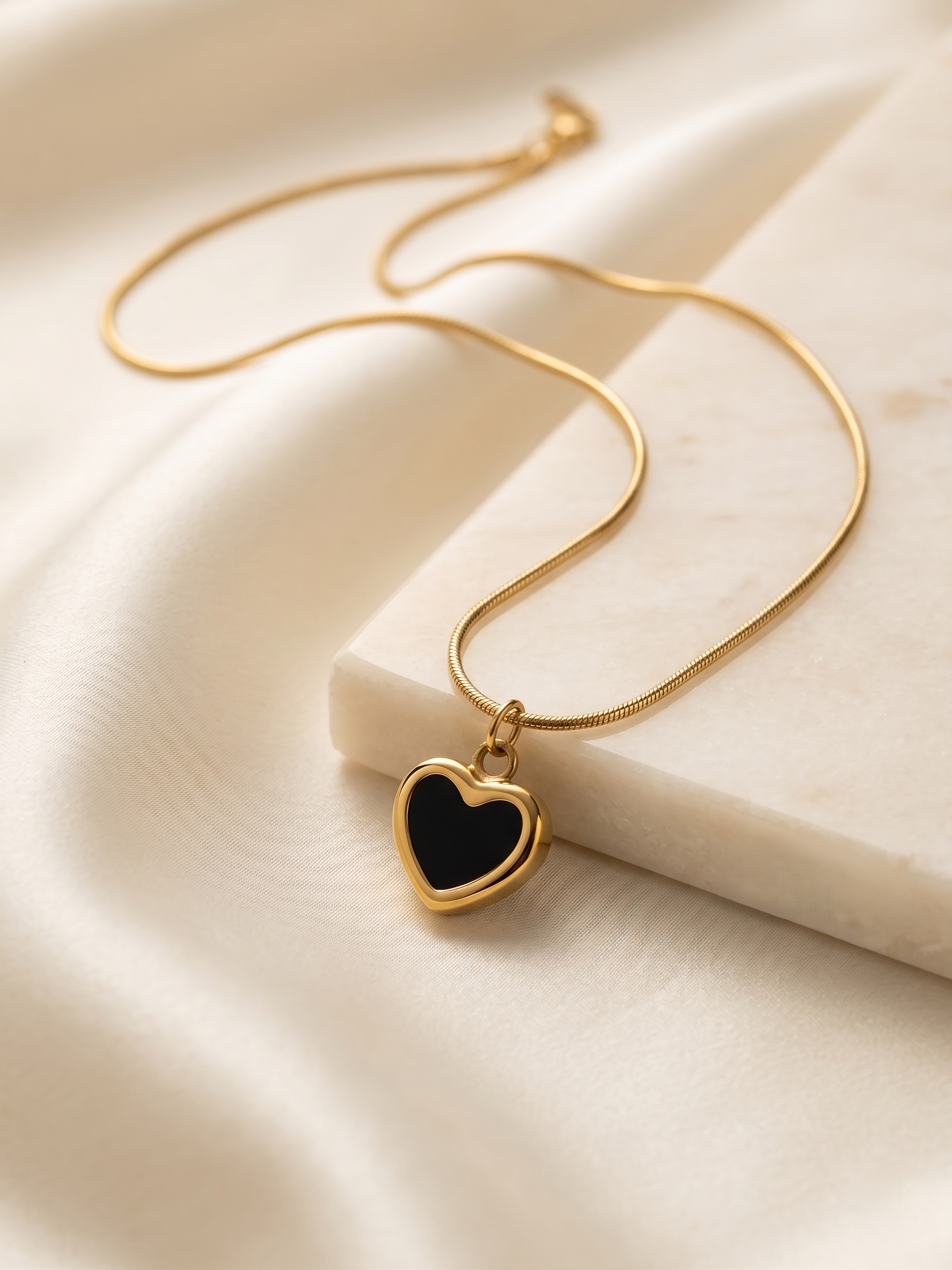 Black Heart Gold Pendant
